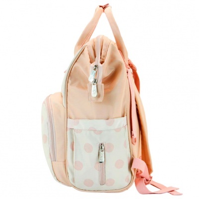 Mochila cor de rosa clara com padrão de bolinhas e zíperes metálicos