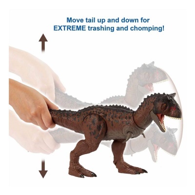 Brinquedo de dinossauro marrom com manchas pretas e boca aberta