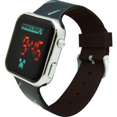 Relógio digital preto com pulseira com padrões azuis e texto Minecraft no ecrã