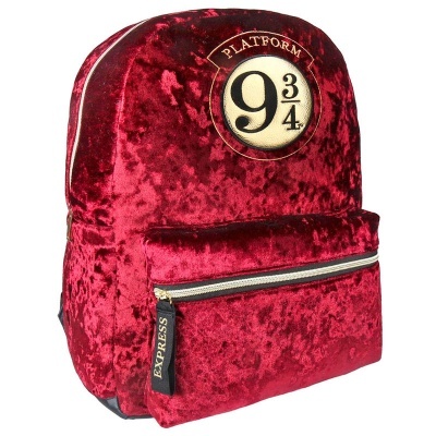 mochila de veludo vermelha com emblema Platform 9 3/4