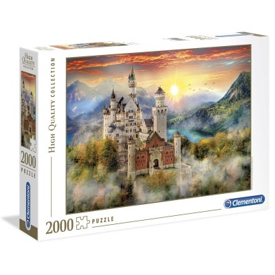 Caixa de puzzle Clementoni com imagem de castelo e montanhas ao pôr do sol.
