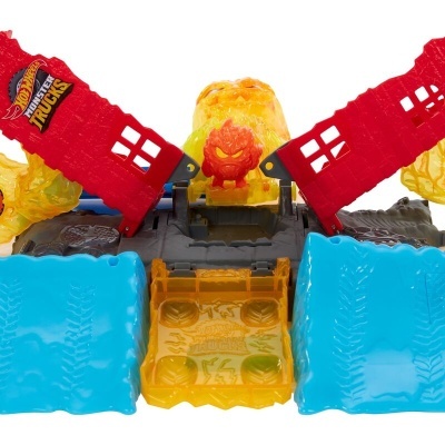 Brinquedo Hot Wheels Monster Trucks com estruturas vermelhas, azuis e amarelas e figura vermelha no centro