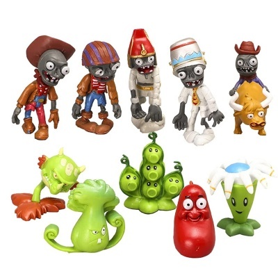 Figuras de plantas e zumbis coloridas em plástico sobre fundo branco