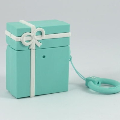 Estojo de silicone azul turquesa com desenho de presente e fita branca