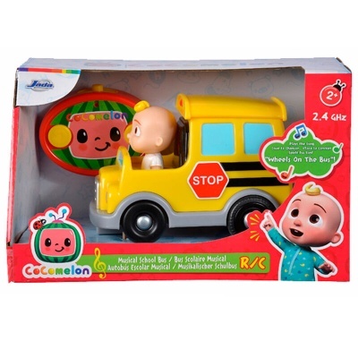 Brinquedo autocarro escolar amarelo com boneco e controlo remoto em embalagem colorida