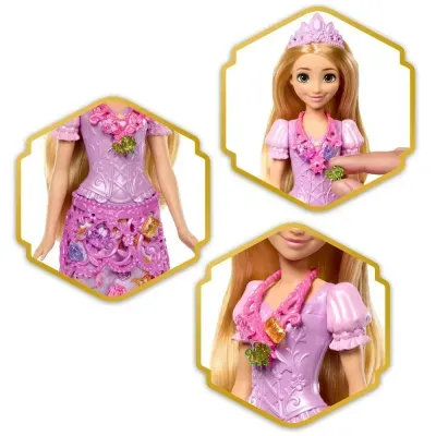 Boneca princesa com vestido rosa e lilás, coroa lilás e colar colorido.