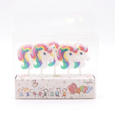 Velas de unicórnio coloridas para festa em embalagem transparente com base decorada