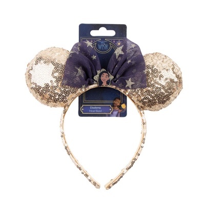 Aro de cabeça com orelhas de lantejoulas douradas e laço roxo com estrelas