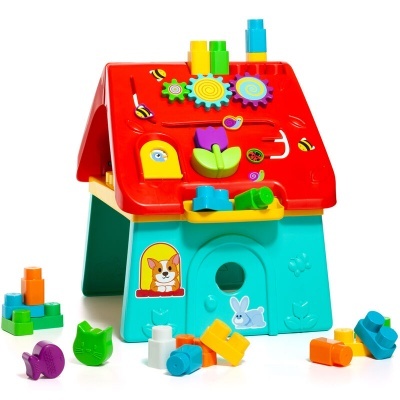 Brinquedo casinha colorida com peças de encaixe coloridas