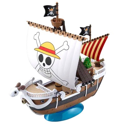 Modelo em miniatura de navio pirata com velas e bandeiras de caveira