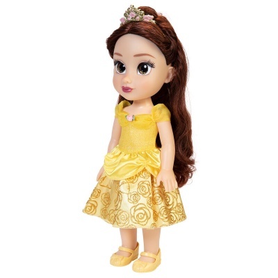Boneca com vestido amarelo e cabelo castanho longo