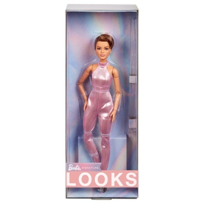 Boneca Barbie com macacão cor-de-rosa brilhante em caixa transparente