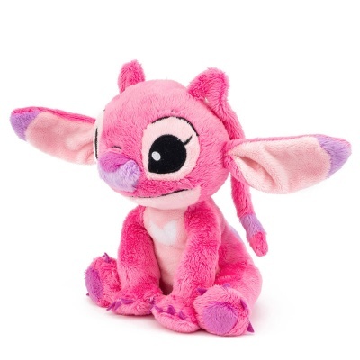 Boneco de peluche rosa e lilás com olhos grandes e pretos