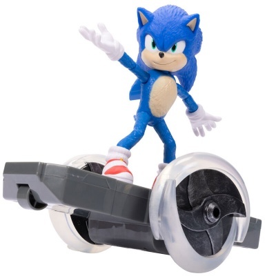 Boneco de Sonic azul numa prancha com rodas grandes
