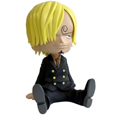 Figura de personagem com cabelo amarelo e fato preto sentado