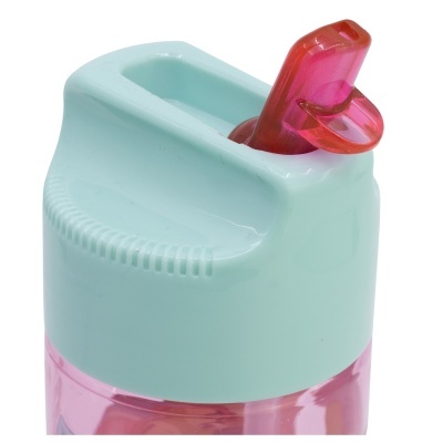 Frasco plástico cor-de-rosa com tampa azul clara e válvula de bombeamento cor-de-rosa