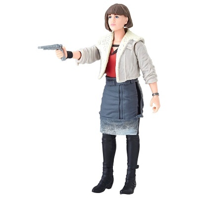 Figura de ação feminina com casaco cinzento, saia azul e botas pretas segurando uma arma.