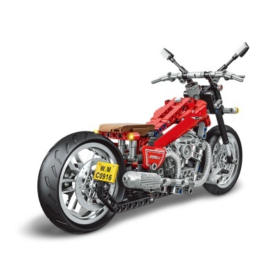 Moto de brinquedo LEGO vermelha e preta com matricula amarela