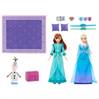 Conjunto de bonecas e acessórios coloridos incluindo boneco de neve e tapete.