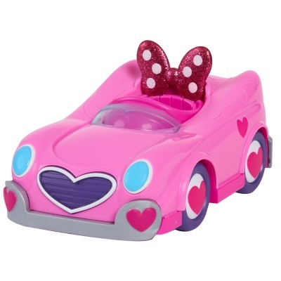 Carro de brinquedo cor-de-rosa com corações e volante em forma de laço