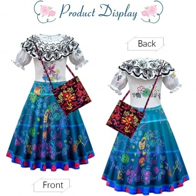 Conjunto de roupa feminina colorida com saia azul, blusa branca bordada e bolsa preta colorida