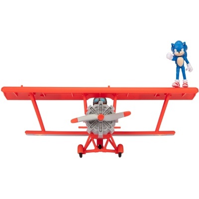 Brinquedo de avião biplano vermelho com figura do Sonic em cima
