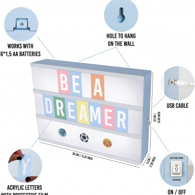 letreiro luminoso colorido com texto BE A DREAMER em fundo branco
