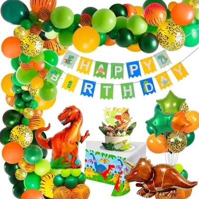 Decoração de aniversário com balões coloridos e balões em forma de dinossauros