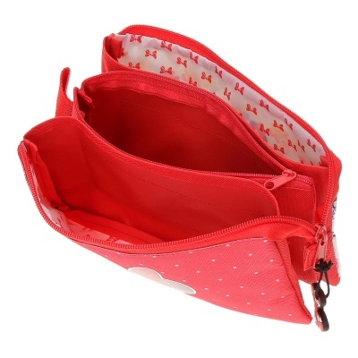 Bolsa vermelha com vários compartimentos e padrão de pontos brancos.