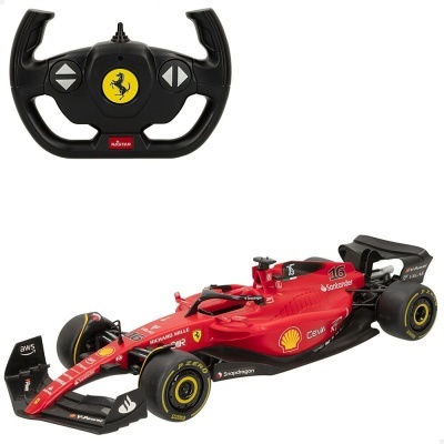 Maquete de carro de Fórmula 1 vermelho com comando preto e logotipo Ferrari