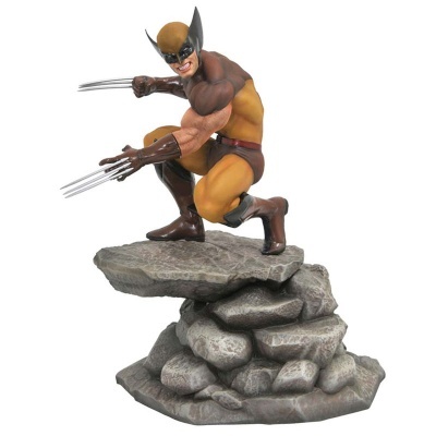 Figura colecionável do Wolverine em pose de ataque sobre base de pedras.
