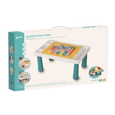 Mesa multifuncional branca com pernas azuis e base amarela com blocos coloridos, em embalagem branca.