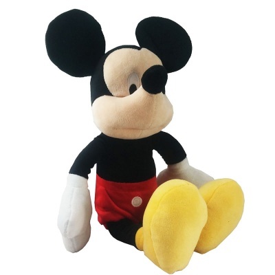 Pelúcia do rato Mickey sentado com calças vermelhas e sapatos amarelos