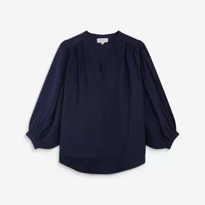 Blusa azul escura de senhora com mangas compridas bufantes e decote em V