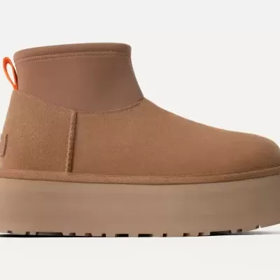 Bota camel com sola plataforma espessa e faixa elástica