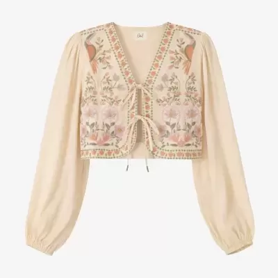 Camisa cropped creme com bordados florais e de pássaros, mangas compridas e laços frontais.