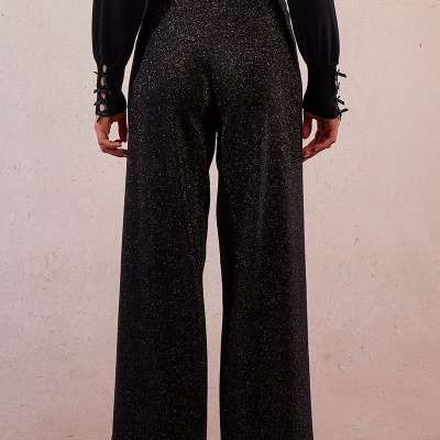 Calças largas pretas com brilho dourado e cintura alta