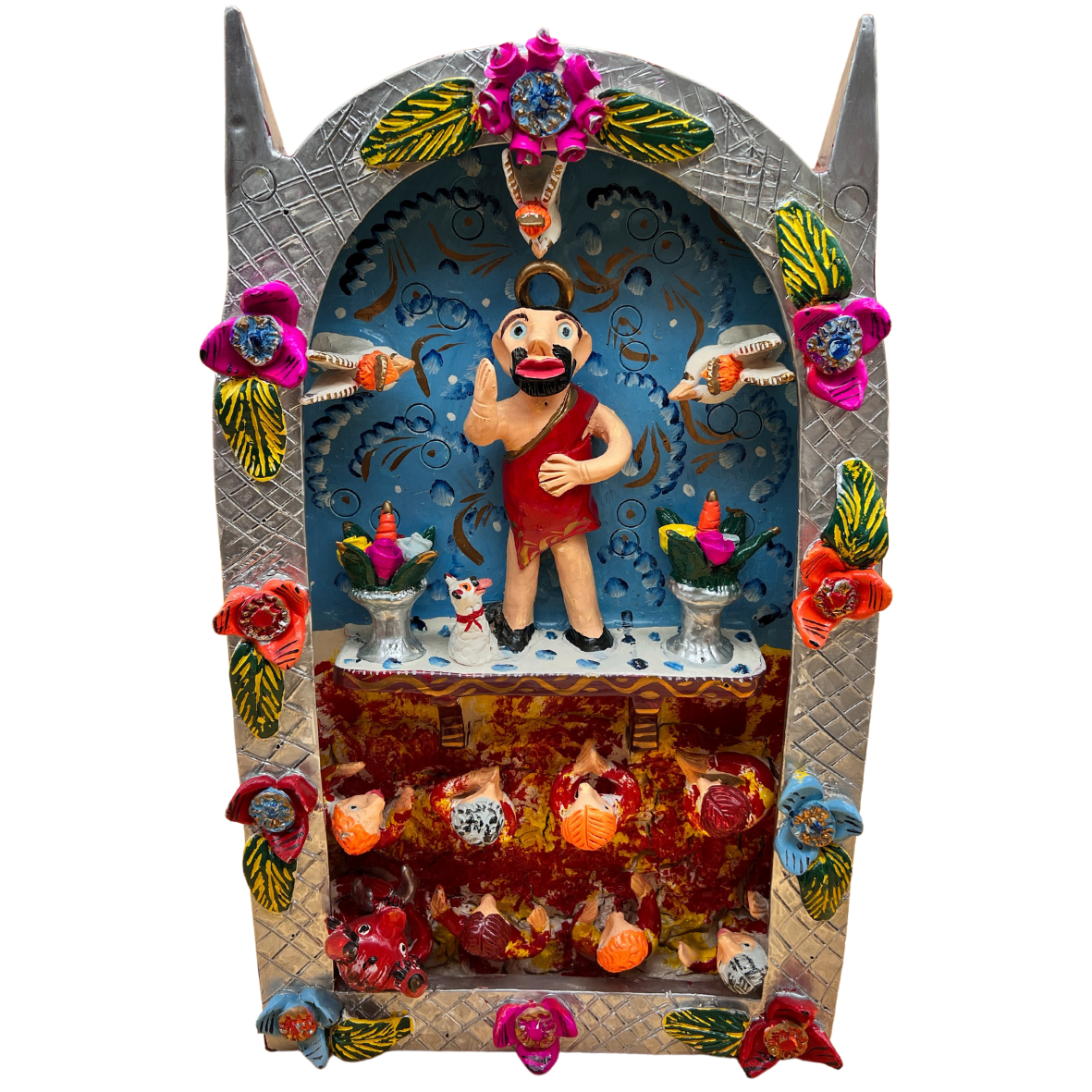Nicho mexicano decorativo com figura de homem e pássaros, flores coloridas, fundo azul e animais na base.
