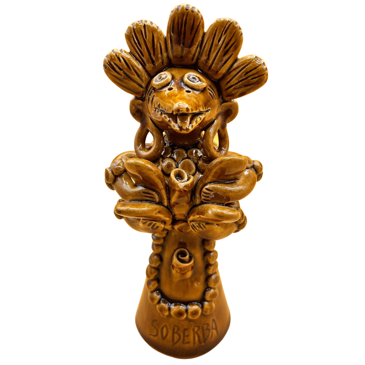 Figurinha decorativa em cerâmica castanha com personagem sorridente e flores