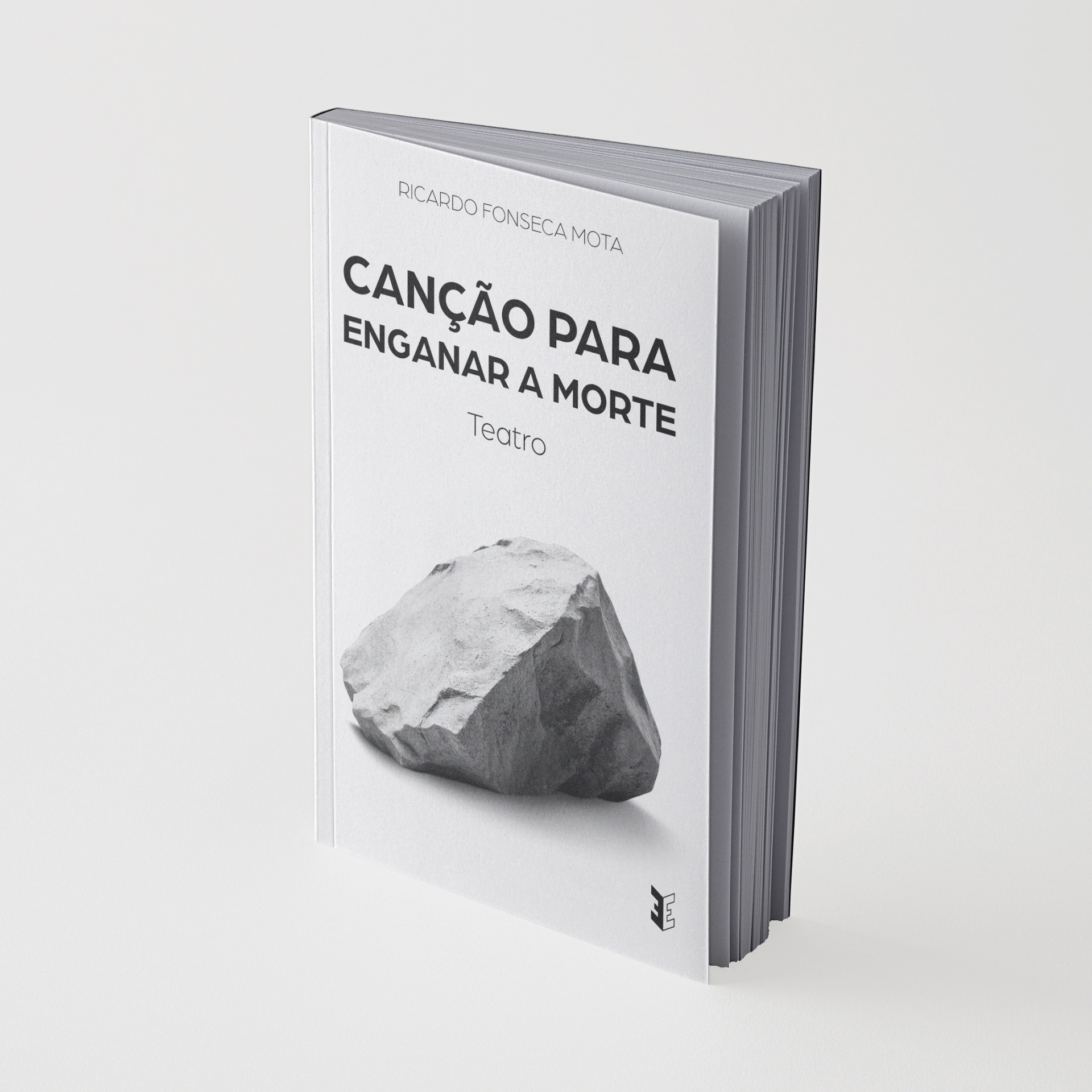 Capa de livro branca com pedra e título em preto