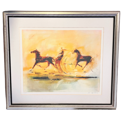 Quadro com pintura de cavalos em movimento em cores amarelas e laranja com moldura prateada