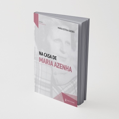 Livro com capa branca e detalhes em cor de rosa, título e autor visíveis.