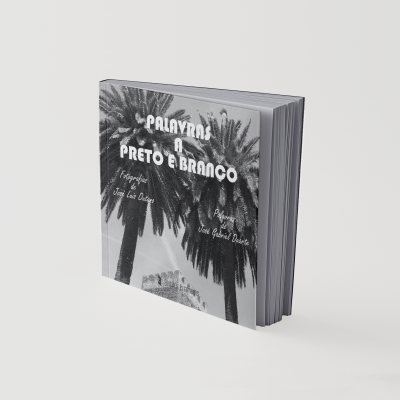 Livro de capa preta e branca com imagem de palmeiras e texto PALAVRAS A PRETO E BRANCO