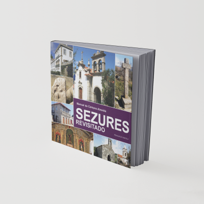Livro com capa dura e fotos de monumentos históricos com título em português