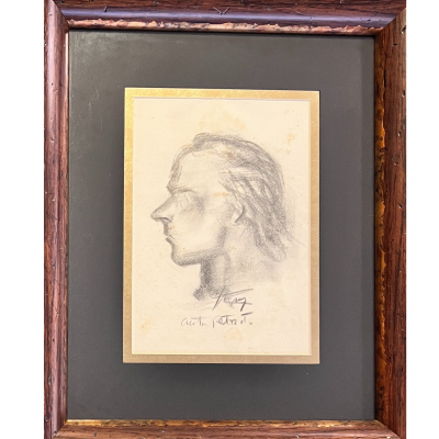 Desenho a lápis de perfil humano assinado e emoldurado em madeira escura.