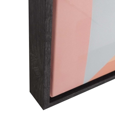 Canto de moldura preta em madeira com impressão colorida abstrata