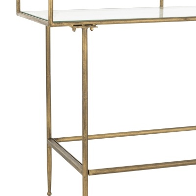 Estrutura metálica dourada envelhecida com prateleira de vidro transparente
