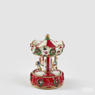 Carrossel natalício decorativo com figurações de Natal coloridas e detalhes dourados