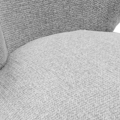 Cadeira estofada cinzenta de tecido texturizado com assento redondo e encosto curvo.