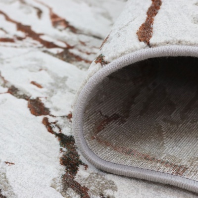 Tapete texturado com padrão abstrato em branco, bege, castanho e verde, borda cinza